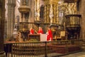 World famous censer in action with archbishop on background. Botafumeiro the biggest censer in world in Cathedral of Saint James