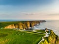 World famous Cliffs of Moher, one of the most popular tourist destinations in Ireland. Aerial view of known tourist attraction on Royalty Free Stock Photo