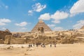 World famous Giza pyramids and the Great Sphinx with tourist