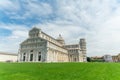 World famous Piazza dei Miracoli in Pisa under a cloudy sky