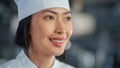World Famous Restaurant: Portrait of Smiling Asian Female Chef Cooking Delicious, Steamy, Authentic Royalty Free Stock Photo