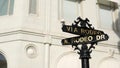 World famous Rodeo Drive symbol, Cross Street Sign, Intersection in Beverly Hills. Touristic Los Angeles, California, USA. Rich Royalty Free Stock Photo