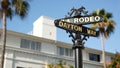 World famous Rodeo Drive symbol, Cross Street Sign, Intersection in Beverly Hills. Touristic Los Angeles, California, USA. Rich Royalty Free Stock Photo