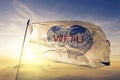 World Federation of Trade Unions WFTU flag textile cloth fabric waving on the top sunrise mist fog