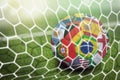 World flags soccer ball in goal net Royalty Free Stock Photo