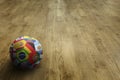 World flags soccer ball on parquet floor Royalty Free Stock Photo