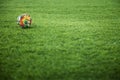 A world flags soccer ball on the playing field Royalty Free Stock Photo