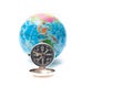 World globe and compass isolated over white background Royalty Free Stock Photo