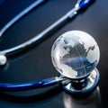 World globe crystal glass on stethoscope