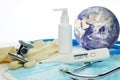 World globe, stethoscope, medical masks, sanitizer, thermometer on white background. Quarantine Concept of coronavirus, covid