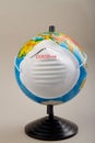 World globe wearing protective mask to protect from coronavirus.