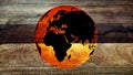 World Globe Wood Background. A world globe on a rustic wood background Royalty Free Stock Photo