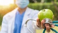 World health day, an apple a day keeps the doctor away concept for health benefit by eating high nutritious clean food and healthy