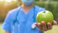 World health day, an apple a day keeps the doctor away concept for health benefit by eating high nutritious clean food and healthy