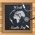 World health day concept with globe on blackboard on wooden table