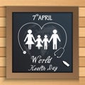 World health day concept with healthy family under stethoscope on blackboard on wooden table