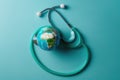 World Health Day. Global Health Awareness concept. Globe inside stethoscope. Green Earth day concept