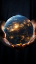 The world held in two substantial hands , Earth Hour concept