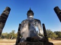 A World Herritage Buddha in Thailand with a sun set and silhouette