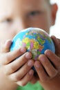 The world in kids hands Royalty Free Stock Photo