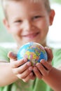 The world in kids hands Royalty Free Stock Photo