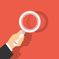 Vector Illustration Of A Magnifying Glass in Hand Royalty Free Stock Photo