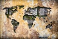 World map as a crack in old ruined, vintage wall Royalty Free Stock Photo