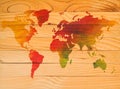 World map. Colourful world map painted in a wooden canvas.