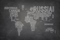 World map composed from country names on black blackboard Royalty Free Stock Photo