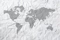 World map on crumpled and aged paper. Royalty Free Stock Photo
