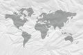 World map on crumpled and aged paper. Royalty Free Stock Photo