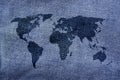 World map on denim jeans background