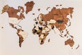 World map of earth showing continents on a wood tree ring textured background on white Royalty Free Stock Photo