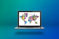 World Map made of icons on a laptop screen Royalty Free Stock Photo