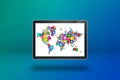 World Map made of icons on a tablet PC screen Royalty Free Stock Photo