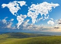 World map made of white fluffy clouds against a blue sky on a warm summer morning. Royalty Free Stock Photo