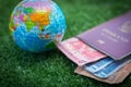 World map and passport and money Royalty Free Stock Photo