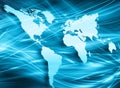 World map on a technological background, glowing lines symbols of the Internet, radio, television, mobile and satellite