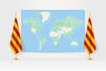 World Map between two hanging flags of Catalonia flag stand