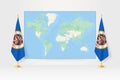 World Map between two hanging flags of Minnesota flag stand Royalty Free Stock Photo