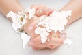 World map on woman crossing hands. Human resources concept. Hiring poster or flyer design