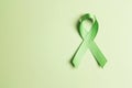 World mental health day concept. Green awareness ribbon with copy space for text