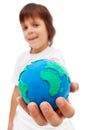 The world in my hand - young boy holding earth globe Royalty Free Stock Photo