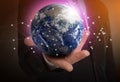 World in our hands. Man holding digital model of Earth, closeup view Royalty Free Stock Photo