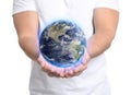 World in our hands. Man holding digital model of Earth on white background, closeup view Royalty Free Stock Photo