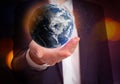 World in our hands. Woman holding digital model of Earth, closeup view Royalty Free Stock Photo