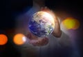 World in our hands. Woman holding digital model of Earth, closeup view Royalty Free Stock Photo