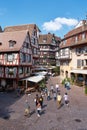 The world in the picturesque medieval old town of Colmar in France