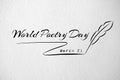 World poetry day card with feather