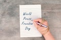 World Press Freedom Day is standing on a paper, hand with pen is chained, free speech, cancel culture, journalist writing Royalty Free Stock Photo